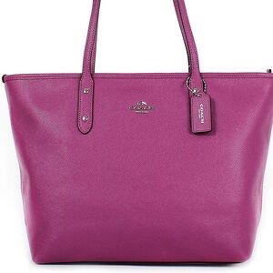 Coach city zip tote bag. Magenta/purple color
